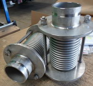 metal bellows expansion joint with victaulic groove nipples and tie rods to control the pressure thrust.