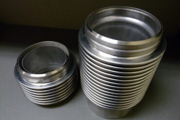 High temperature expansion joint with stainless weld ends